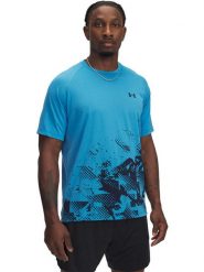 Under Armour Koszulka sportowa w kolorze błękitno-granatowym rozmiar: L. Niebieskie t-shirty sportowe Under Armour, bez wzorów, bez ramiączek, outdoorowe. Za 105.63 zł.
