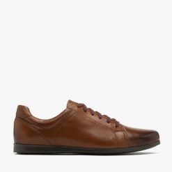 Brązowe półbuty męskie URBAN. Brązowe eleganckie półbuty Ryłko, bez wzorów, ze skóry, bez obcasa, bez zapięcia. W wyprzedaży za 249.99 zł.
