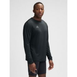 Dżersej z długim rękawem Newline Beat. Czarne bluzki z długim rękawem Newline, bez wzorów, z dżerseju, bez kołnierzyka, bez ramiączek. Za 177.50 zł.