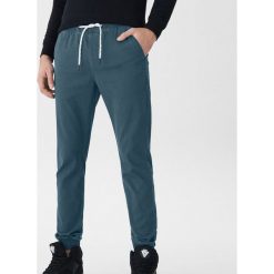 Spodnie typu jogger - Niebieski. Joggery i bojówki marki House. Za 99.99 zł.