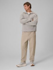 4F Spodnie casual męskie - beżowe L. Brązowe spodnie materiałowe 4F, na co dzień, l, bez wzorów, z dresówki, casualowe, z standardowym stanem. Za 189.99 zł.