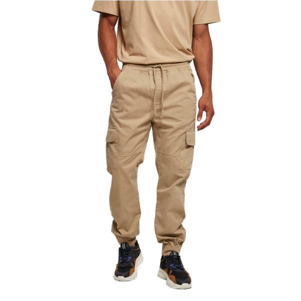 Spodnie do biegania Urban Classics Military. Brązowe szorty Urban Classics, m, bez wzorów, militarne. Za 222.00 zł.