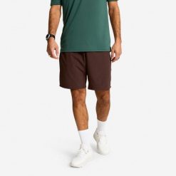 Spodenki fitness cardio męskie Domyos. Brązowe szorty DOMYOS, m, bez wzorów, z materiału, sportowe. Za 79.99 zł.