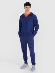 4F Spodnie treningowe szybkoschnące męskie 4F x Robert Lewandowski - granatowe M. Niebieskie spodnie treningowe długie 4F, m, bez wzorów, z materiału. Za 229.99 zł.
