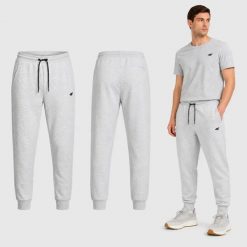 SPODNIE MĘSKIE DRESOWE 4F SPORTOWE DRESY JOGGERY M M1676 SS26. Czarne joggery i bojówki 4F, m, bez wzorów, z bawełny, sportowe. Za 159.99 zł.