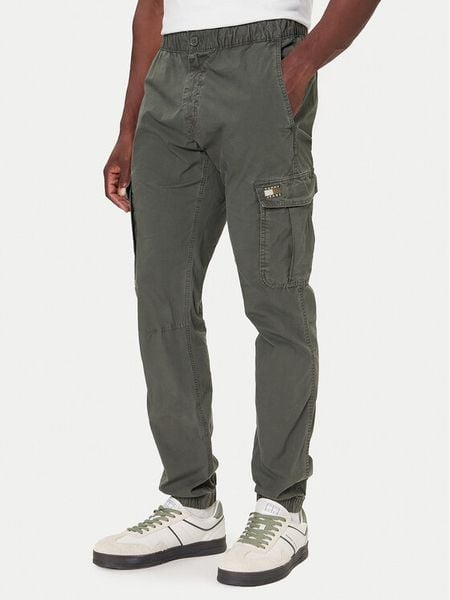 Tommy Jeans Spodnie materiałowe DM0DM22003 Zielony Regular Fit. Zielone spodnie materiałowe Tommy Jeans, m, bez wzorów, z bawełny. Za 429.99 zł.