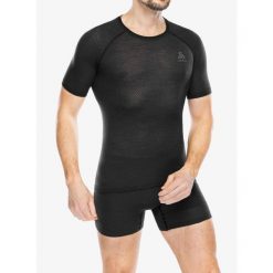Koszulka termoaktywna męska Odlo Merino PW 140 Seamless BL Top Crew Neck SS. Czarne bielizna termoaktywna ODLO, na zimę, m, bez wzorów, bez ramiączek, narciarskie. Za 261.99 zł.