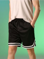 Sportowe szorty z kontrastową lamówką - czarny. Czarne krótkie spodenki sportowe Sinsay, l, bez wzorów. Za 39.99 zł.