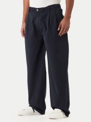 Guess Jeans Spodnie materiałowe M6RB59 WGCV1 Granatowy Relaxed Fit. Niebieskie spodnie materiałowe Guess Jeans, m, z aplikacjami, z bawełny. Za 434.99 zł.