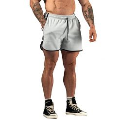 Szorty Nebbia Hero. Brązowe krótkie spodenki sportowe Nebbia, l, bez wzorów, z bawełny. Za 229.99 zł.