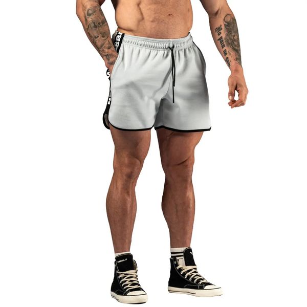 Szorty Nebbia Hero. Brązowe krótkie spodenki sportowe Nebbia, l, bez wzorów, z bawełny. Za 229.99 zł.
