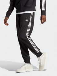 Adidas Spodnie dresowe AEROREADY Essentials Tapered Cuff Woven 3-Stripes Joggers IC0041 Czarny Regular Fit. Czarne joggery i bojówki Adidas, m, bez wzorów, z dresówki, sportowe. Za 229.99 zł.