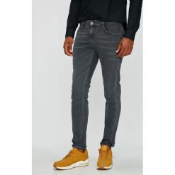 Mustang - Jeansy Oregon Tapered. Jeansy marki Mustang. W wyprzedaży za 199.90 zł.