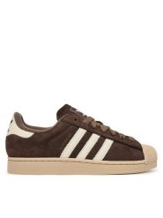 Adidas Sneakersy Superstar II IH9314 Brązowy. Brązowe buty sportowe casual Adidas, bez wzorów, z nubiku, bez zapięcia. Za 529.99 zł.