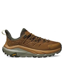 Trekkingi Hoka. Brązowe buty trekkingowe HOKA, bez wzorów, z gore-texu, bez zapięcia. Za 869.99 zł.