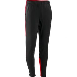 Spodnie do piłki nożnej Kipsta Viralto Club. Czerwone spodnie materiałowe KIPSTA, na co dzień, bez wzorów, z dresówki, sportowe. Za 74.99 zł.