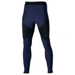 Legginsy Mizuno Tech Thermal Charge. Niebieskie legginsy długie sportowe Mizuno, bez wzorów, do biegania. W wyprzedaży za 367.50 zł.