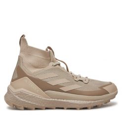 Trekkingi adidas. Brązowe botki sznurowane Adidas, bez wzorów, bez obcasa, bez zapięcia. Za 719.99 zł.