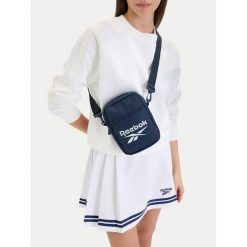 Saszetka Reebok. Niebieskie saszetki i nerki Reebok, bez wzorów. Za 49.99 zł.