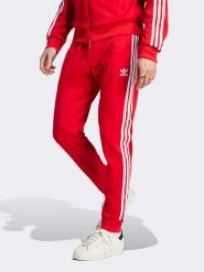 Adidas Spodnie dresowe w kolorze czerwonym rozmiar: XXL. Czerwone spodnie treningowe długie Adidas, xxl, bez wzorów, z dresówki. Za 193.95 zł.