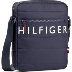 Saszetka TOMMY HILFIGER - Light Nylon Reporter AM0AM02823 413. Saszetki i nerki marki Tommy Hilfiger. W wyprzedaży za 239.00 zł.