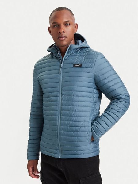 Reebok Kurtka przejściowa RCC00086 Niebieski Regular Fit. Niebieskie kurtki Reebok, m, bez wzorów, z syntetyku, bez kaptura. Za 349.99 zł.