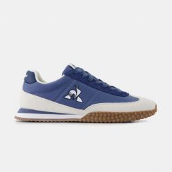 Sneakersy Le Coq Sportif Veloce. Niebieskie buty sportowe casual le coq sportif, bez wzorów, bez zapięcia. Za 411.00 zł.