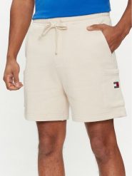 Tommy Jeans Szorty sportowe Badge DM0DM18479 Beżowy Regular Fit. Brązowe krótkie spodenki sportowe Tommy Jeans, m, bez wzorów, z bawełny. Za 299.99 zł.