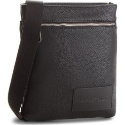 Saszetka CALVIN KLEIN JEANS - Pebble Flat Pack K40K400401 001. Saszetki i nerki marki Calvin Klein Jeans. W wyprzedaży za 269.00 zł.