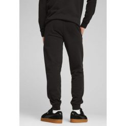 Męskie spodnie dresowe Essentials z logo No. 1 PUMA Black. Czarne eleganckie spodnie Puma, m, z dresówki, eleganckie. Za 240.78 zł.