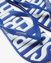 Superdry Vintage Flip Flops REGAL BLUE – męskie klapki japonki. Niebieskie klapki Superdry, z gumy. Za 144.65 zł.