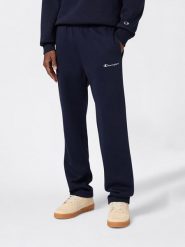 Champion Spodnie dresowe w kolorze granatowym rozmiar: M. Niebieskie spodnie treningowe długie Champion, m, bez wzorów, z bawełny. Za 100.52 zł.