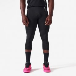 Legginsy koszykarskie 3/4 NBA męskie Tight 900. Czarne legginsy długie sportowe TARMAK, l, bez wzorów, z materiału, na fitness i siłownię. Za 109.99 zł.