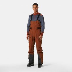 Spodnie narciarskie z szelkami Helly Hansen Sogn Shell. Brązowe spodnie narciarskie i snowboardowe Helly Hansen, m, bez wzorów, narciarskie. W wyprzedaży za 1,349.50 zł.