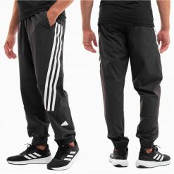 Męskie spodnie dresowe adidas Future Icons 3S Woven. Białe spodnie materiałowe Adidas, na co dzień, m, bez wzorów, z dresówki, sportowe. Za 229.99 zł.