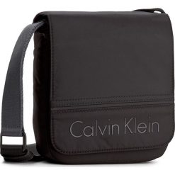Saszetka CALVIN KLEIN - Matthew Reporter Wi K50K502894 001. Saszetki i nerki marki CALVIN KLEIN. W wyprzedaży za 229.00 zł.