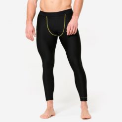 Legginsy do MMA męskie. Czarne legginsy długie sportowe DOMYOS, l, bez wzorów, z elastanu. Za 99.99 zł.