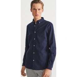 Bawełniana koszula z drobnym wzorem - Granatowy. Koszule marki Under Armour. Za 99.99 zł.