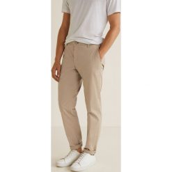 Mango Man - Spodnie Barna3. Spodnie materiałowe marki Mango Man. Za 199.90 zł.