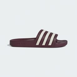 Klapki adilette Aqua. Białe klapki Adidas, z materiału. Za 99.95 zł.