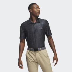 Koszulka polo Ultimate365 Print. Czarne koszulki polo Adidas, m, bez wzorów, z materiału, bez kołnierzyka, bez ramiączek. W wyprzedaży za 183.45 zł.
