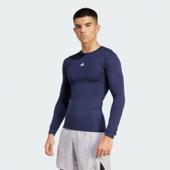 Koszulka TECHFIT Compression Training Long Sleeve. Niebieskie odzież kompresyjna Adidas, bez wzorów, z materiału, techfit (adidas). Za 179.00 zł.