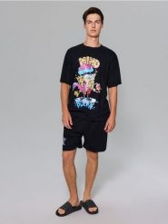 Bawełniana piżama dwuczęściowa SpongeBob - czarny. Czarne piżamy Sinsay, l, bez wzorów, z bawełny, bez ramiączek. Za 45.99 zł.