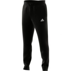 Spodnie męskie adidas Essentials Tapered Cuff Pants. Białe spodnie treningowe długie Adidas, m, bez wzorów. Za 129.00 zł.