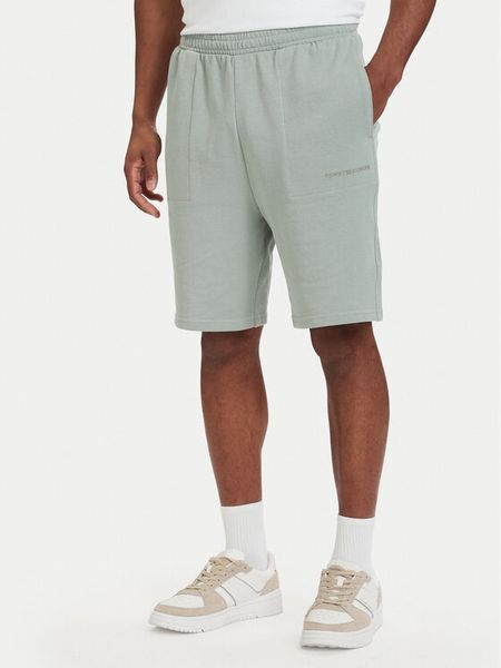 Tommy Hilfiger Szorty sportowe Essential UM0UM03914 Zielony jasny Regular Fit. Zielone krótkie spodenki sportowe Tommy Hilfiger, l, bez wzorów, z bawełny. Za 188.99 zł.