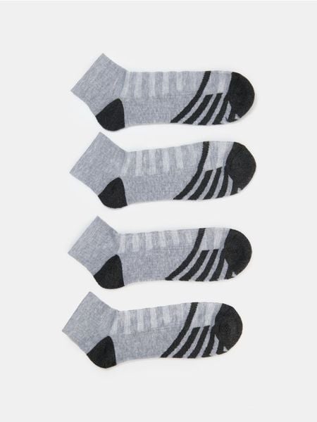 Prążkowane skarpetki w paski 4 pack - wielobarwny. Skarpety Sinsay, bez wzorów, prążkowane. Za 12.99 zł.
