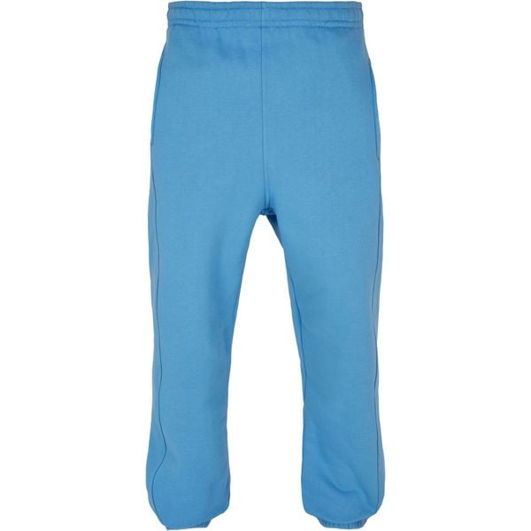 Spodnie do biegania Urban Classics. Niebieskie spodnie materiałowe Urban Classics, na co dzień, m, bez wzorów, długie. Za 176.00 zł.