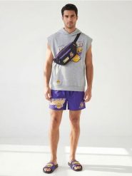 Saszetka NBA - czarny. Czarne torby na ramię Sinsay, bez wzorów, małe, bez dodatków. Za 29.99 zł.