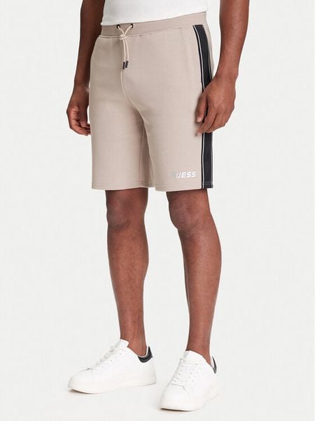 Guess Szorty sportowe Z4RD04 KB3P2 Beżowy Regular Fit. Brązowe krótkie spodenki sportowe Guess, m, z aplikacjami, z bawełny. Za 241.99 zł.