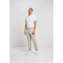 Spodnie Urban Classics basic. Szare spodnie materiałowe Urban Classics, na co dzień, m, bez wzorów, z dresówki, sportowe. Za 198.50 zł.